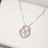 Pingente Lock Coração em Ouro Branco e Diamantes