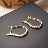 Brincos Meia Argola Em Ouro Amarelo 18k 750