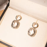 Brincos Hstern Heritage em Ouro Nobre e Cristal de Rocha