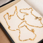 Colar de corrente elos Cingapura em ouro amarelo com 49cm de comprimento e 0.1cm de espessura. Peso 1.6g.