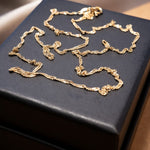 Colar de corrente malha cingapura em ouro amarelo com 50cm de comprimento e 0.1cm de espessura. Peso 2.4g.