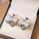 Brinco Flor Orquidea em Ouro Branco e Diamantes