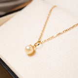 Pingente de Ouro Amarelo com Pérola Dourada Natural