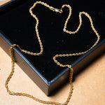 Colar cordão trançado em ouro amarelo com 46.5cm de comprimento e 2mm de espessura.