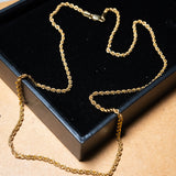 Colar cordão trançado em ouro amarelo com 46.5cm de comprimento e 2mm de espessura.