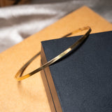 Bracelete fino em ouro amarelo com 2.2g e 6.4cm por 5.2cm e espessura de 0.2cm