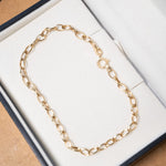 Pulseira de elos delicada em ouro amarelo com 1.6g 19cm de comprimento e 0.3cm de espessura.