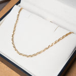 Colar cordão trançado em ouro amarelo com 41cm de comprimento e 2mm de espessura.